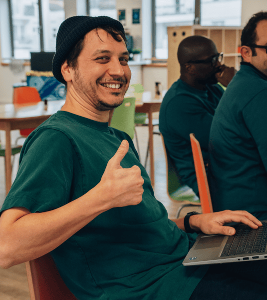 Powell player in office smiling