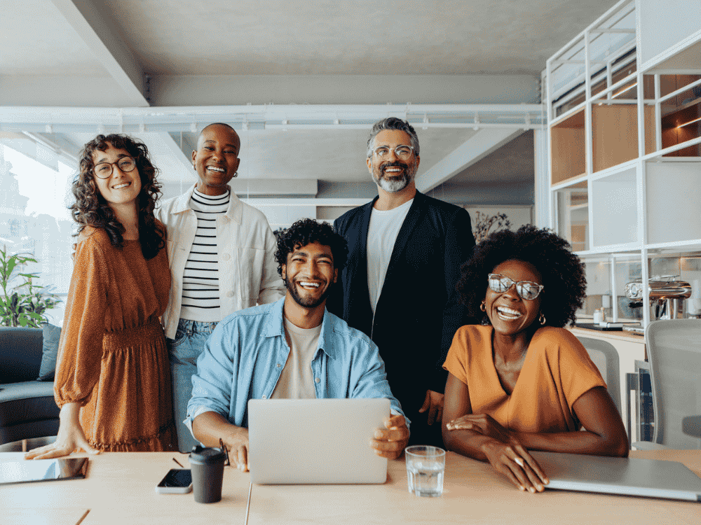 Smiling coworkers representing happy Microsoft partnership